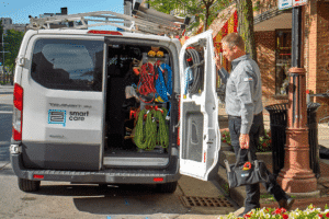 Technician arriving at job site.